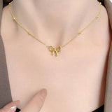 Gold Bow Pendant Choker Necklace