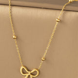 Gold Bow Pendant Choker Necklace